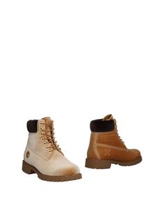 Полусапоги и высокие ботинки Timberland