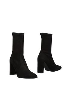 Полусапоги и высокие ботинки Stuart Weitzman