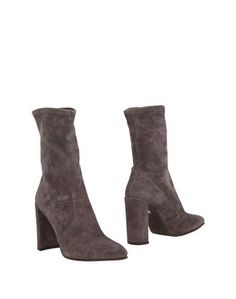 Полусапоги и высокие ботинки Stuart Weitzman