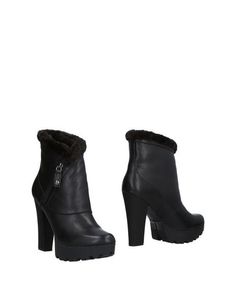 Полусапоги и высокие ботинки Guess