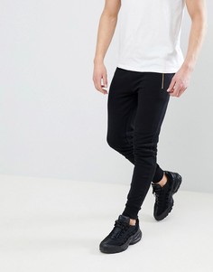 Черные супероблегающие джоггеры с карманами на золотистой молнии ASOS DESIGN - Черный