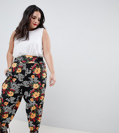 Гаремные брюки с цветочно-звериным принтом ASOS DESIGN Curve - Зеленый