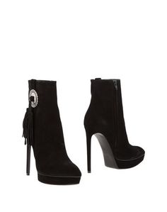 Полусапоги и высокие ботинки Saint Laurent
