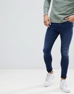 Темно-синие джинсы с напылением ASOS DESIGN - Синий