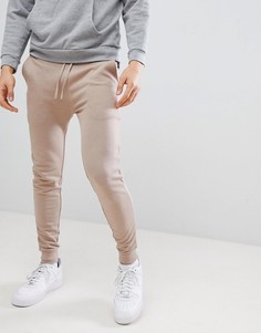 Бежевые супероблегающие джоггеры ASOS DESIGN - Бежевый