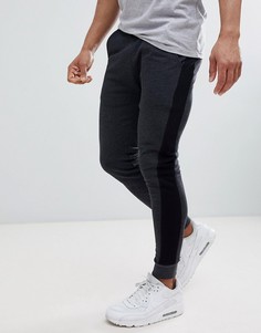 Темно-серые супероблегающие джоггеры с полосками ASOS DESIGN - Серый