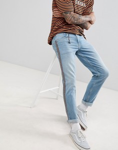Светлые узкие джинсы с ацтекской полосой по бокам ASOS DESIGN - Синий