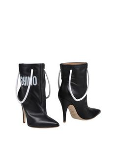 Полусапоги и высокие ботинки Moschino