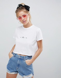 Укороченная футболка с принтом цветов и стрел ASOS DESIGN - Белый