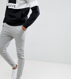 Супероблегающие светло-серые спортивные штаны ASOS DESIGN Tall - Серый
