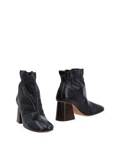 Полусапоги и высокие ботинки CÉline