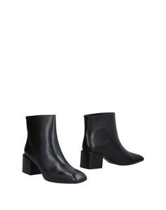 Полусапоги и высокие ботинки Jil Sander