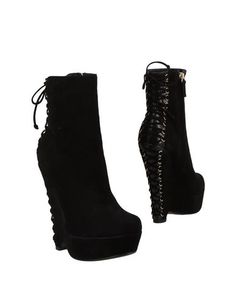 Полусапоги и высокие ботинки Saint Laurent