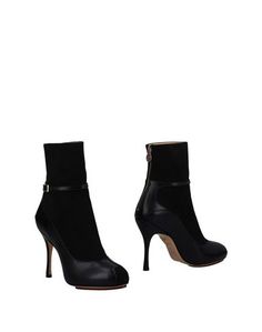 Полусапоги и высокие ботинки Charlotte Olympia