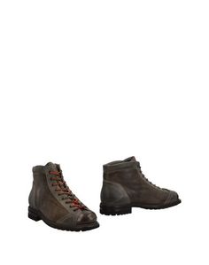 Полусапоги и высокие ботинки Santoni