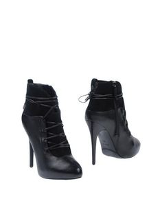 Полусапоги и высокие ботинки Guess
