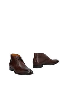 Полусапоги и высокие ботинки Santoni