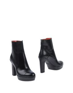 Полусапоги и высокие ботинки Santoni