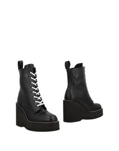 Полусапоги и высокие ботинки Sacai