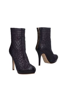 Полусапоги и высокие ботинки Versace