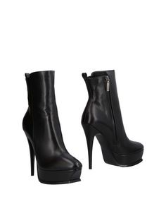 Полусапоги и высокие ботинки Saint Laurent