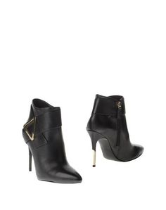 Полусапоги и высокие ботинки Guess