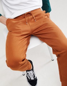 Темно-оранжевые джоггеры узкого кроя ASOS DESIGN - Оранжевый