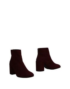 Полусапоги и высокие ботинки Stuart Weitzman