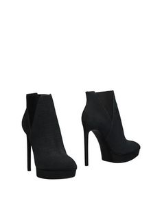 Полусапоги и высокие ботинки Saint Laurent