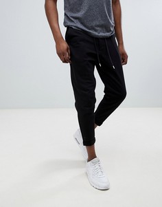 Черные облегающие укороченные джоггеры ASOS DESIGN - Черный