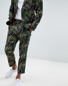 Зеленые суженные книзу брюки с растительным принтом ASOS - Зеленый