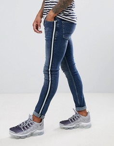Темно-синие джинсы скинни с полосками по бокам ASOS DESIGN - Синий