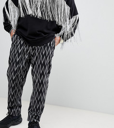 Суженные книзу брюки с ацтекским принтом ASOS DESIGN Plus - Черный