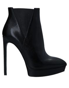 Полусапоги и высокие ботинки Saint Laurent