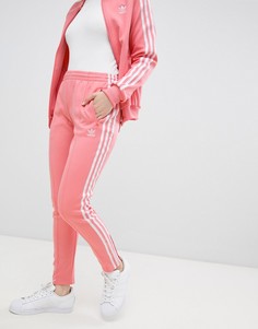 Розовые брюки-сигареты с тремя полосками Adidas Originals - Розовый