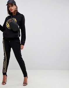 Джоггеры от комплекта с логотипом цвета металлик Versace Jeans - Черный