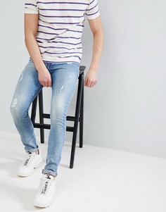 Синие выбеленные джинсы скинни с потертостями ASOS DESIGN - Синий