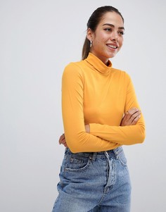 Кроп-топ с воротником поло и длинными рукавами ASOS DESIGN - Желтый