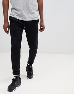 Черные джоггеры скинни с контрастной окантовкой ASOS DESIGN - Черный