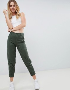 Узкие брюки цвета хаки в стиле милитари ASOS DESIGN - Зеленый