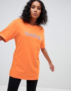 Оранжевая футболка с надписью Weekday - Оранжевый