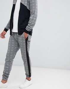 Облегающие джоггеры в клетку с полосками по бокам ASOS DESIGN - Черный
