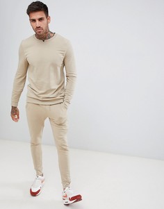 Обтягивающий спортивный костюм бежевого цвета ASOS DESIGN - Бежевый