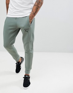 Зеленые облегающие джоггеры Puma 57680923 - Зеленый