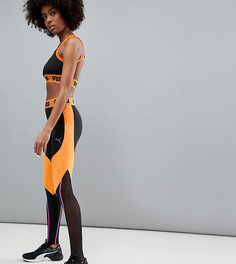 Черно-оранжевые леггинсы Puma эксклюзивно для Asos - Оранжевый