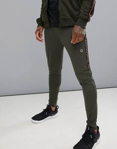 Спортивные штаны с отделкой лентой по бокам Jack & Jones Core Perfromance - Зеленый