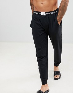 Джоггеры с кромкой манжетом и монограммой Calvin Klein - Черный