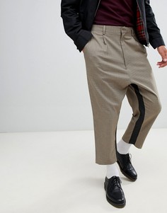 Суженные книзу брюки в клетку с заниженным шаговым швом и полосками ASOS DESIGN - Бежевый
