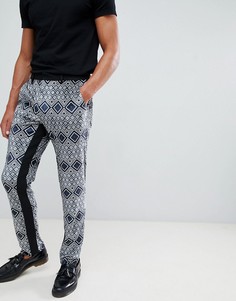 Черные строгие брюки скинни с ацтекским принтом ASOS DESIGN - Черный