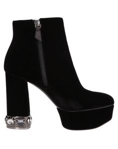 Полусапоги и высокие ботинки Casadei